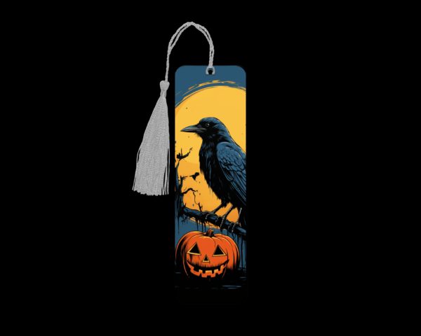 Crow Pumpkin metal bookmark. The bookmark is metal with a silver tassel. The image is printed onto the top and is smooth and glossy.