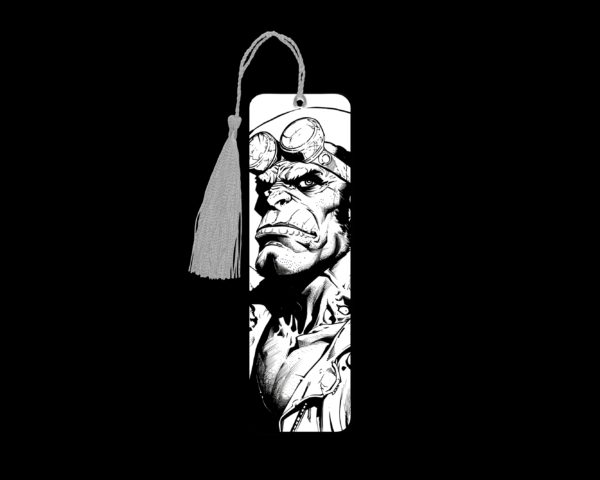 Hellboy metal bookmark. The bookmark is metal with a silver tassel. The image is printed onto the top and is smooth and glossy. Features: 4.7″ x 1.3″ x 0.02″ Metal Bookmark Made Metal Aluminum Plate Colors may vary due to screen resolution. The bookmarks may be different slightly from the listing image as each are hand pressed.