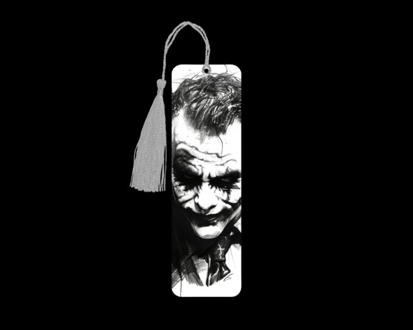 Ledger Joker metal bookmark. The bookmark is metal with a silver tassel. The image is printed onto the top and is smooth and glossy. Features: 4.7″ x 1.3″ x 0.02″ Metal Bookmark Made Metal Aluminum Plate Colors may vary due to screen resolution. The bookmarks may be different slightly from the listing image as each are hand pressed.