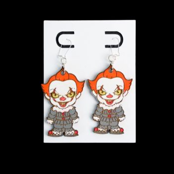 Pennywise wood earrings with a gray suit and orange hair earrings.