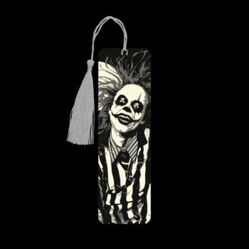 Beetlejuice inspired metal bookmark. The bookmark is metal with a silver tassel. The image is printed onto the top and is smooth and glossy.