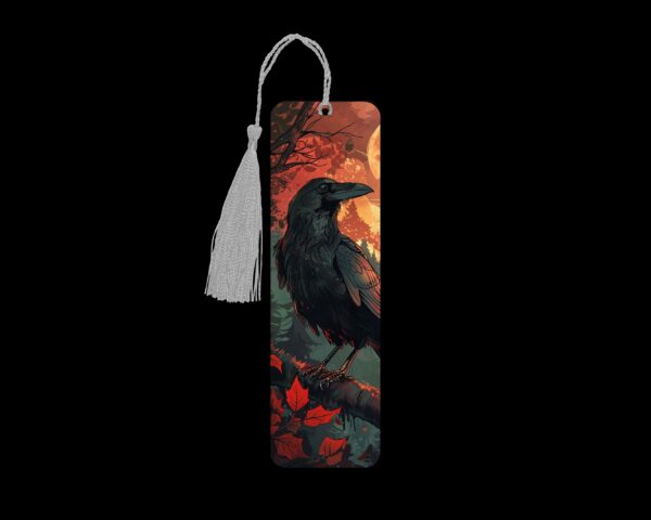 Autumn crow metal bookmark. The bookmark is metal with a silver tassel. The image is printed onto the top and is smooth and glossy.