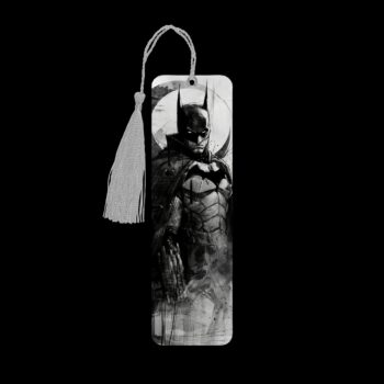 Dark Knight metal bookmark. The bookmark is metal with a silver tassel. The image is printed onto the top and is smooth and glossy.