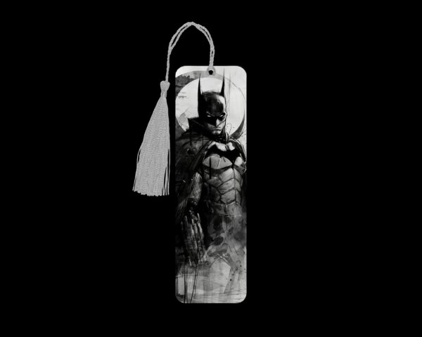 Dark Knight metal bookmark. The bookmark is metal with a silver tassel. The image is printed onto the top and is smooth and glossy.