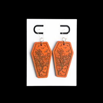 Coffin Orange Earrings. These earrings are made with 1/8″ thickness basswood. These earrings are lightweight and hand painted. They are not sealed to keep a rustic look and feel.