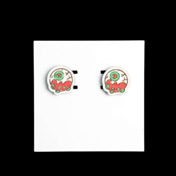 Eyeball Cake Stud Wood Earrings. These earrings are made with 1/8″ thickness basswood. These earrings are lightweight and hand painted.