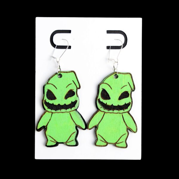 Oogie Boogie Wood Earrings. These earrings are made with 1/8″ thickness basswood. These earrings are lightweight and hand painted.