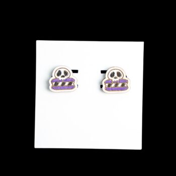 Skull Whoopie Pie Stud Wood Earrings. These earrings are made with 1/8″ thickness basswood. These earrings are lightweight and hand painted.