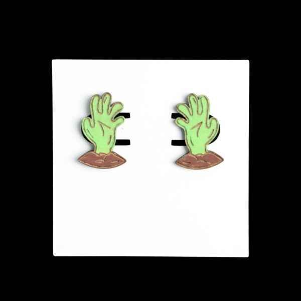 Zombie Hands Stud Wood Earrings. These earrings are made with 1/8″ thickness basswood. These earrings are lightweight and hand painted.